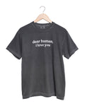 Gray t-shirt with 'dear human, i love you' text on a hanger against a white background
